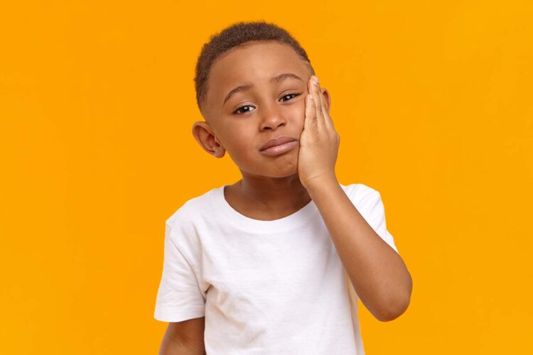 kids with tooth pain
